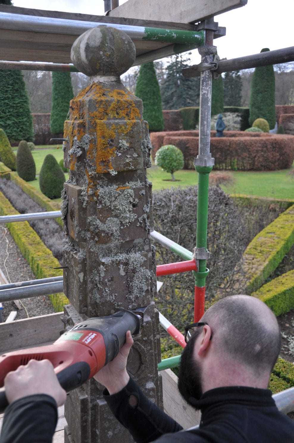 Careful cutting through a mortar joint to dismantle the Drummond Castle Obelisk Sundial