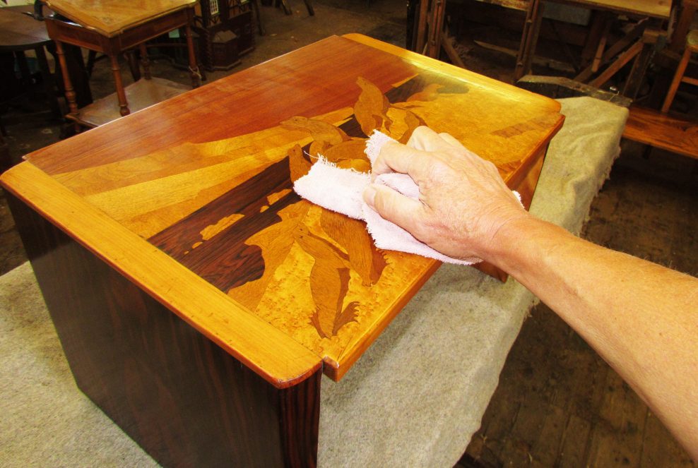 Conservation of a nest of tables by Emile Galle,
