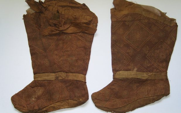 A pair of silk boots