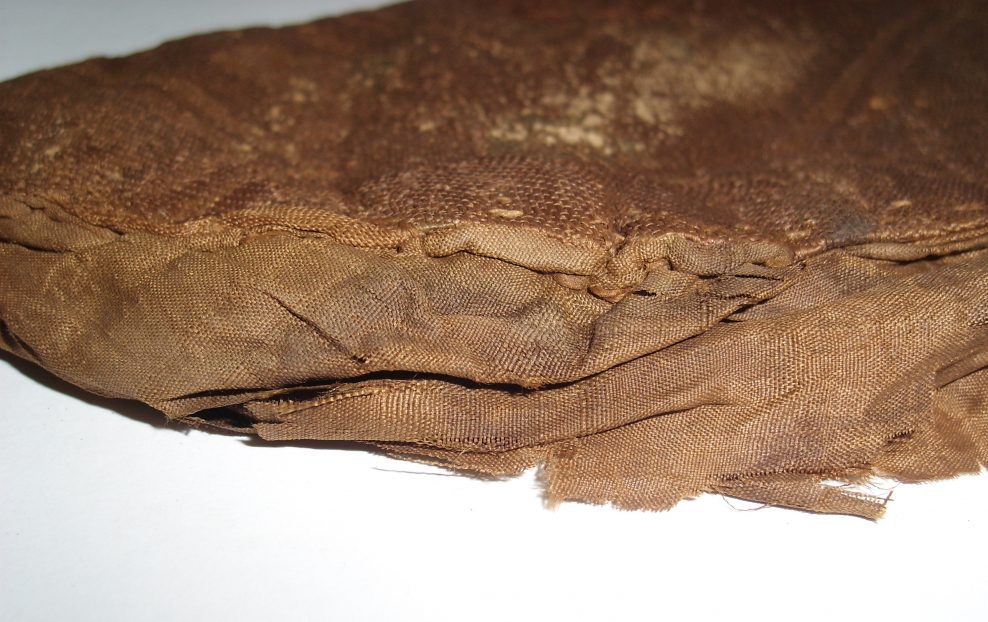 Showing the damaged sole before conservation