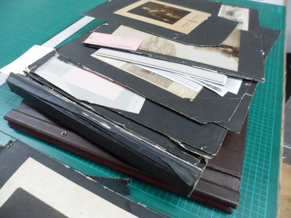 Restoration and re-binding of two photograph albums